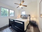 Queen bedroom with ceiling fan